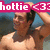Pixelated image of a person in swimwear with pink text overlay reading 'hottie <33' against a blurred background.