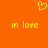 A static orange background with a yellow pixelated heart symbol above two identical lines of yellow text reading 'in love' in lowercase.