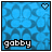 Two side-by-side pixelated images with blue patterned backgrounds, each displaying the text 'gobby' at bottom and a heart symbol in top-right corner; left image has black-outlined white heart, right image has solid white heart.