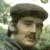 A static image shows a person in a flat cap with text reading "this looks like a Bicycle Repair Man" on a dark background.