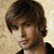 Four distinct portrait images of a young man in various poses and attire arranged in a
