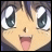 Anime-style character face with large blue eyes, brown hair, and tongue sticking out, next to pixelated text on black background.