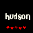 Pixelated text 'hudson' in white with red heart symbols below on black background, showing animation change between two states.