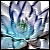 Pixelated abstract composition with blue, white, and dark gray tones forming indistinct shapes against a light background.