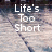 A pixelated image with text fragments arranged across four quadrants on a blurred background.