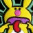 A 48x48 pixel buddy icon featuring a yellow cartoon character with green accents, pink nose, purple mouth area, and red tongue sticking out, displayed in a 2x2 contact sheet layout with text fragments on black backgrounds.