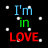 A 48x48 pixel animated buddy icon displaying the phrase "I'm in LOVE." with blue, green, and red text on a black background, featuring white star-like dots that shift position between two frames.