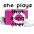 Pixelated pink camera icon with white rings and gray accents, overlaid with black text reading "she plays that song over & over again because it reminds her OF YOU" across four