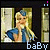 Animated contact sheet of a blonde woman in blue dress with text overlays forming 'baby cant see im calling like you should a waming' across 25 frames.