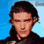 Pixelated static image of a person with dark hair against a blue sky background, rendered in low-resolution 256x256 pixels with visible dithering and blocky artifacts.