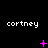 Pixelated text 'cortney' repeated three times per on black background with pink star-like symbols changing across frames