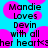 Pixelated text on a cyan background with pink circular shapes, displaying 'Mandie Loves Devin with all her heart<3' in black block letters.