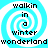 A static image with four identical showing a blue and white spiral background and black text reading "walkin in a winter wonderland"