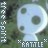 Pixelated icon with a large light blue circular face, dark green eyes and mouth, vertical white text on left, 'KATiLE' at bottom right.