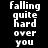 Pixelated text displays 'falling quite hard over you' with pink highlight bars shifting across each word in sequence.