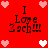 Red background with pixelated hearts and repeated text "I Love Zach" in black, white, and pink. Animated heart colors shift between frames.