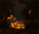 Animated sequence showing a fireplace with flickering flames and smoke, viewed from a fixed angle with dark surroundings.