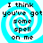 Four identical pixelated display a blue and white spiral background with black text reading "I think you've got some spell on me" in each