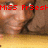 Pixelated image of a person in light-colored clothing with red text overlay reading 'MISS Fr3est' against a brown and yellow background.