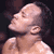 Pixelated close-up of a person's upper body and head against dark background, showing light skin tone, closed eyes, and visible neck muscles.