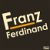 Pixelated text reads 'Franz Ferdinand' with a horizontal brown stripe across the middle, set against a dark background.