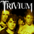A 2x2 contact sheet of four animated frames showing the band Trivium with color-filtered versions (yellow, orange, purple, green) and repeated "TRIVIUM" text at top of each frame.
