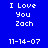 Blue background with white pixelated text reading "I Love You Zach" and "11-14-07" in four , each with a different light effect