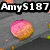 Animated icon shows a pink and orange gradient circle on a gray background with scattered green and yellow dots, then transitions to a black background with two overlapping blue and pink shapes under a pink heart.