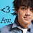 Pixelated image of a person with dark hair and light skin wearing a gray jacket over a white shirt against a light blue background with text elements.