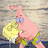 Pixelated image of pink starfish character holding yellow sponge-like figure with heart above, on yellow background with text.