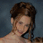 A pixelated image of a person with brown hair against a dark background, overlaid on a bright pink field with cyan text reading "My Favorite Owner".