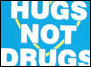 Blue background with white text reading HUGS NOT DRUGS and yellow curved lines forming a heart shape around the text.