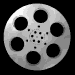 Six circular silver film reels with black perforations arranged in a on black background, each reel showing distinct dot patterns at center