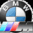 A circular BMW M logo with blue and white quadrants, black outer ring with 'BMW M' text, and three diagonal stripes in cyan, purple, and red below the circle.