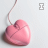 Animated contact sheet of a pink heart-shaped pendant on a string with changing text across frames, displayed in a 3x3 grid layout against a light gray background.
