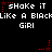 Pixelated text repeats 'Shake it like a black girl' with red star accents on a black background, animated by pulsing stars.