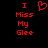 Red pixelated text and a heart symbol on a black background, with the text 'I Miss My Glee' displayed twice.