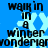 Blue background with light blue snowflakes and black text reading "walkin in a winter wonderland" arranged in four