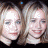 A 48x48 pixel animated contact sheet showing two side-by-side frames of a person with light brown hair against a dark background, next to green text reading "Original Icons .com" on a solid green background.