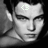 Two side-by-side pixelated grayscale images of a person's face with text changes: first shows '<3' on forehead, second displays 'Hi Keley' in top-right.