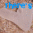 Blue pixelated text 'There's this boy......' appears over a light-colored, textured background with brown and beige tones.