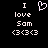 Pixelated white text and symbols on black background: 'I' above a heart, then 'love', 'Sam', and three '<3' emoticons in two side-by-side