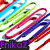 Colorful paperclips in red, blue, green, pink, and purple arranged diagonally with text "Enikaz" in different colors on a black background.