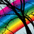 Rainbow-colored tree with black branches against a white background, displaying gradient hues from red to purple.