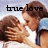 Two pixelated figures in a close embrace, one with brown hair and white shirt, the other with dark hair, under black text reading 'true love' on light background.