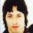 Static 48x48 pixel icon showing a close-up of a person's face with dark hair, red lips, and light skin tone against a white background.