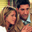 A 48x48 pixel animated buddy icon featuring two characters from Friends in a close embrace on the left frame, transitioning to green text reading "Original Icons .com" on a dark green background on the right frame.