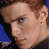 Pixelated close-up of a person's face with brown hair and blue background, likely from a Star Wars-themed buddy icon.