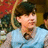 A pixelated image shows a person in a light blue shirt against a red background with orange text reading "Oh no, where's Trevor?" and two names below.