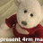 A plush teddy bear in a red shirt with black eyes and gray nose, positioned against a striped background.